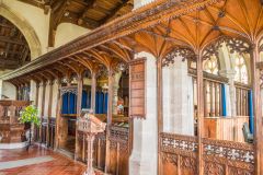 The ornately carved 15th century chancel screen