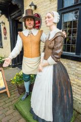 Models of Cromwell and his wife outside the entrance