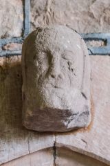 Medieval carved head over the vestry door