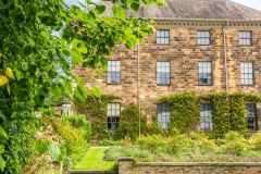 Formal gardens beside the house