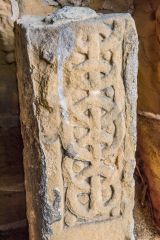 A Celtic cross shaft in the church porch