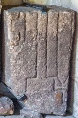 Unusual grave slab with keys and sword symbols