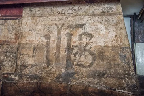 'IHS' over the 1350 fireplace