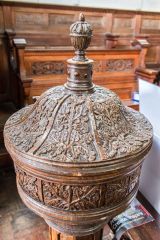The ornate 17th century font cover