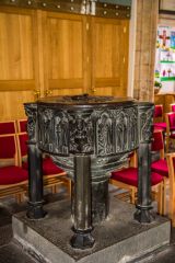 The beautifully carved 14th century font