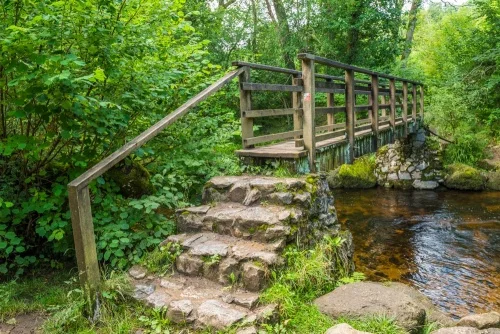 A picturesque footbidge over the River Bovey