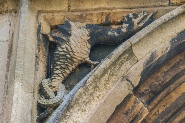Carving of a wyvern on the south porch