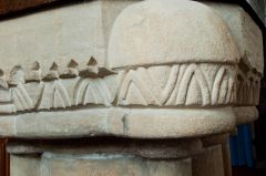 Traditional Norman carving pattern on the font bowl