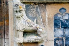A fearsome lion on the south porch