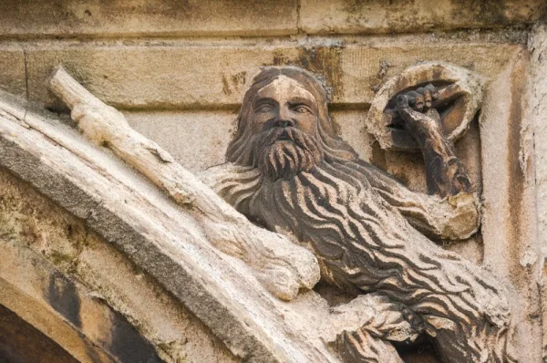Carving of a woodwose on the south porch