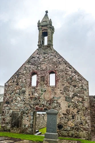 The west facade and 1635 belfry
