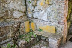 Stone benches outside the holy well