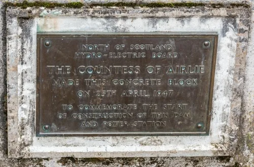 The dam dedication plaque