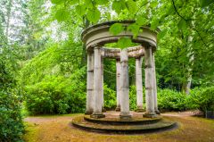 Pashley Manor Gardens, A classical temple in a wooded glade