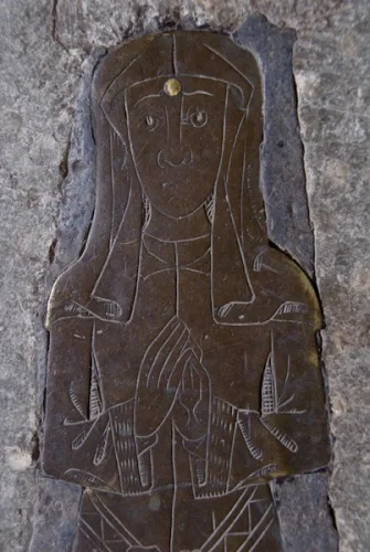 Medieval brass of a woman
