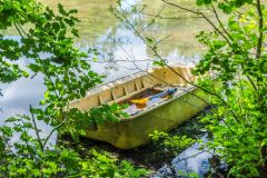 A boat floating on the lake