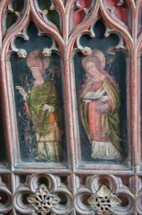 A bishop and female saint