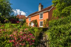 A pretty cottage just below the village pub