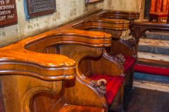 Choir stalls with carved heads