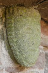 Norman carved head, north doorway
