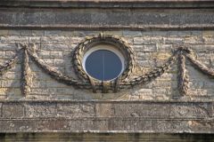 Neo-classical wreath on the house facade