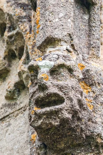 Carved head, north facade