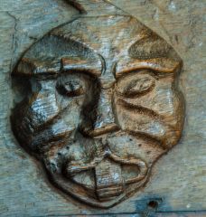 Misericord of a grotesque face