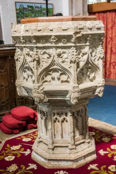 The ornate 14th century font