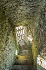 Down an internal staircase