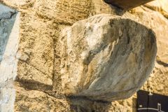 Medieval stone corbel built into the wall