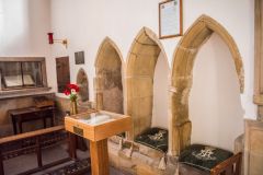 The 13th-century sedilia and piscina