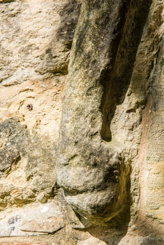 Medieval carved head, west doorway