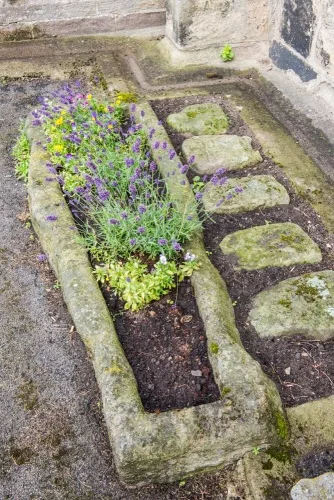 Medieval gravestones and coffin