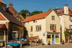 Boats drawn up by the shore