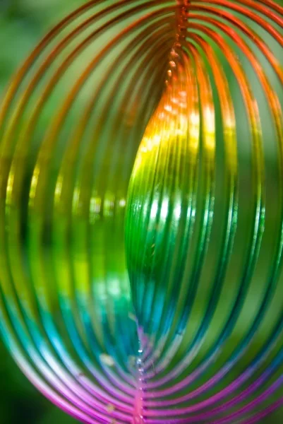 A colourful neo-pagan offering hanging over the labyrinth carvings