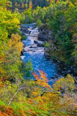 The waterfall and suspension bridge from the trail