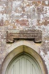 Medieval 'Omnia Vanitas' stone over the church door