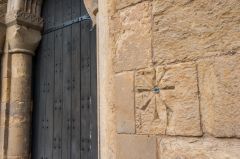 A scratch dial outside the church door