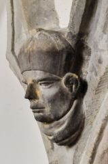 Carved head on the medieval sedilia
