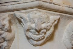 14th century carved head on a nave capital