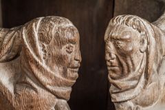 Pair of carved heads on the chancel stalls