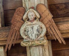 A carved angel on the chancel roof