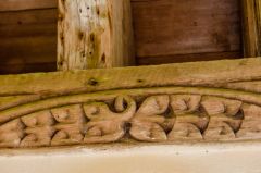 Carved beam inside the porch