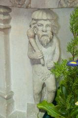 Saxmundham, St John the Baptist Church, An unrepentant woodwose on the font stem