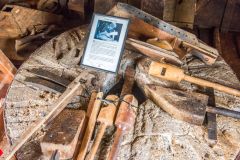 A millstone and dressing tools