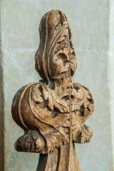 A 15th century poppyhead bench end