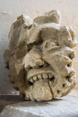 A grotesque medieval carved head