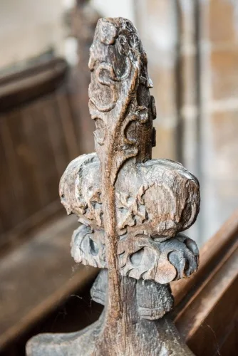 15th-century poppyhead bench end