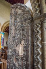 The ornate 13th-century door and ironwork hinges