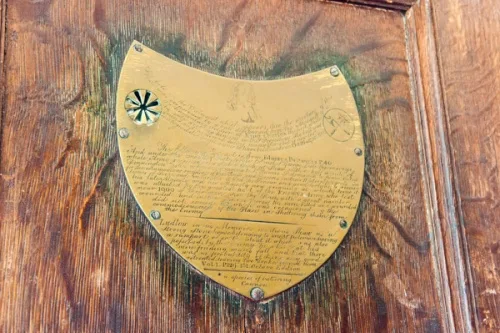 Charles I plaque (musket ball hole at the upper left)